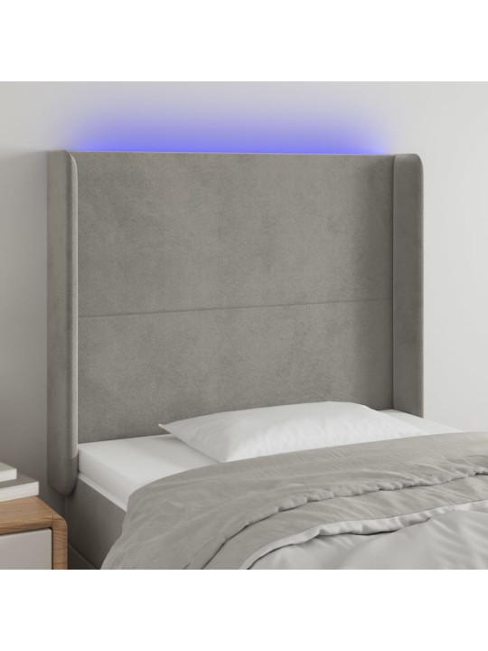 Čelo postele s LED světle šedé 93x16x118/128 cm samet