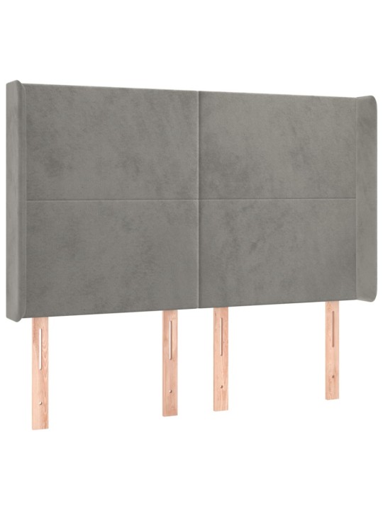 Čelo postele s LED světle šedé 147x16x118/128 cm samet