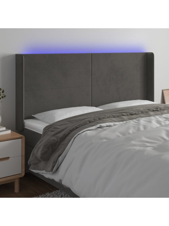 Čelo postele s LED tmavě šedé 163 x 16 x 118/128 cm samet