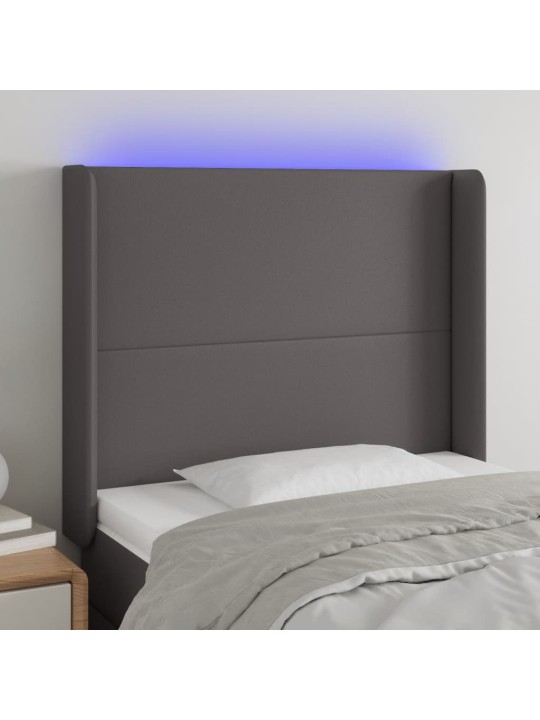 Čelo postele s LED šedé 83 x 16 x 118/128 cm umělá kůže