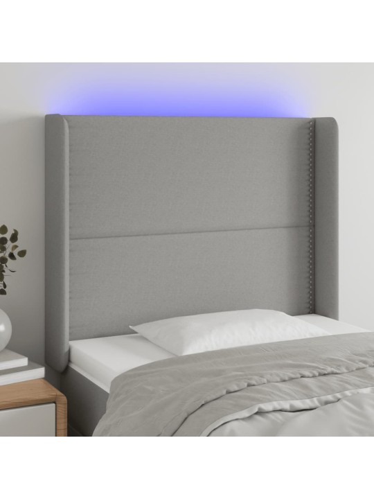 Čelo postele s LED světle šedé 93x16x118/128 cm textil