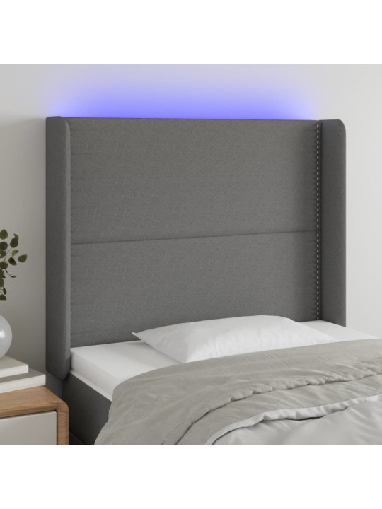 Čelo postele s LED tmavě šedé 103 x 16 x 118/128 cm textil