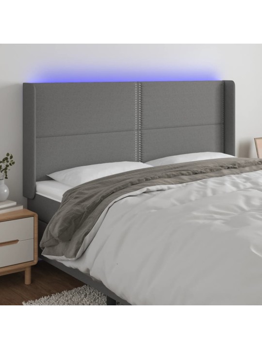 Čelo postele s LED tmavě šedé 163 x 16 x 118/128 cm textil
