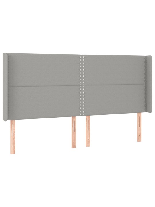 Čelo postele s LED světle šedé 203x16x118/128 cm textil