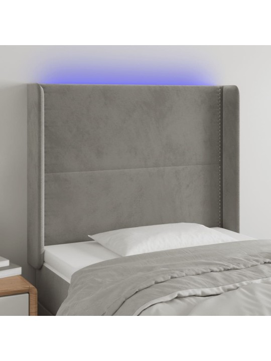 Čelo postele s LED světle šedé 103 x 16 x 118/128 cm samet