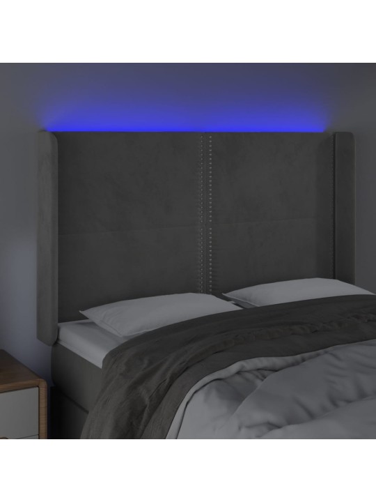 Čelo postele s LED světle šedé 147x16x118/128 cm samet