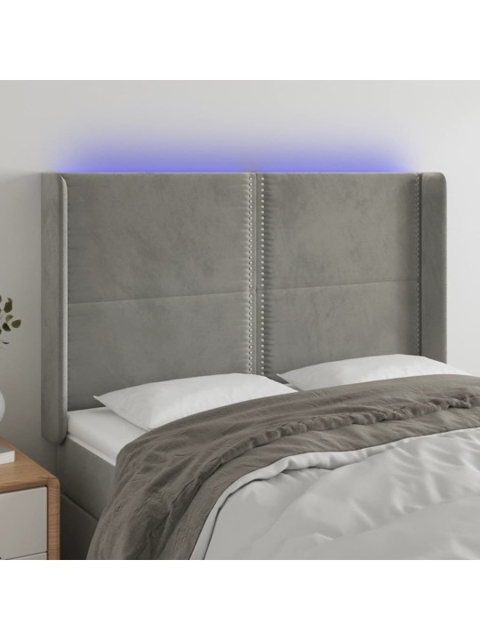Čelo postele s LED světle šedé 147x16x118/128 cm samet