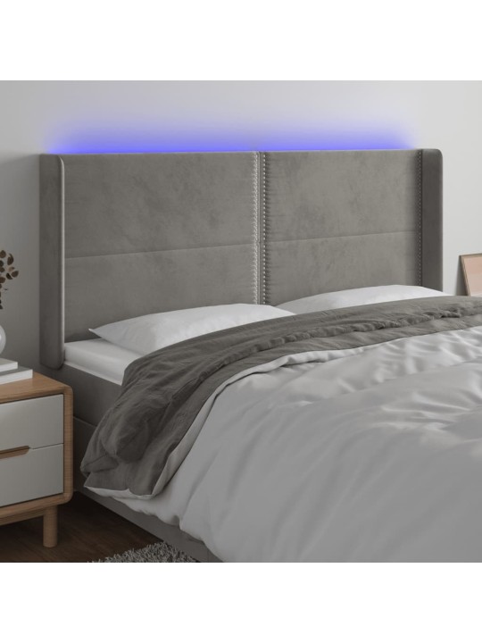 Čelo postele s LED světle šedé 183 x 16 x 118/128 cm samet