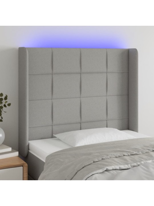 Čelo postele s LED světle šedé 83 x 16 x 118/128 cm textil