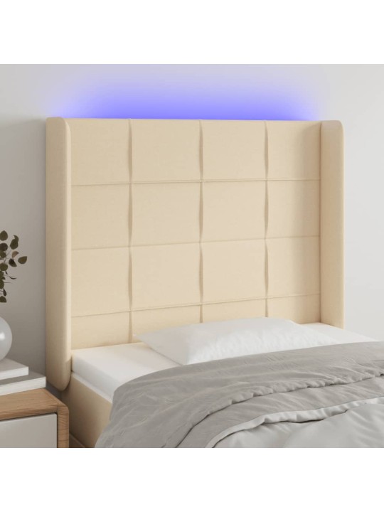 Čelo postele s led krémové 83 x 16 x 118/128 cm textil