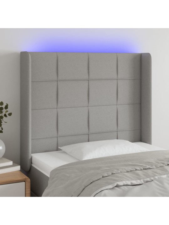 Čelo postele s LED světle šedé 103x16x118/128 cm textil