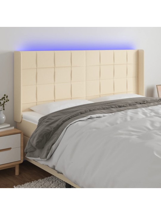 Čelo postele s led krémové 163 x 16 x 118/128 cm textil