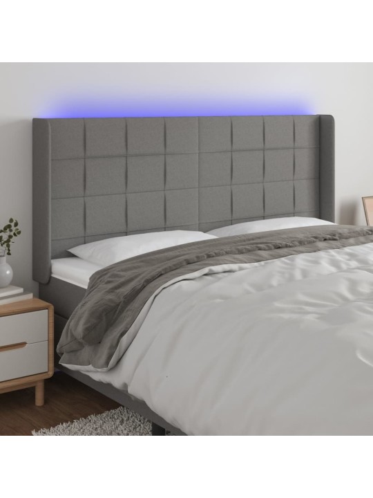 Čelo postele s LED tmavě šedé 183 x 16 x 118/128 cm textil