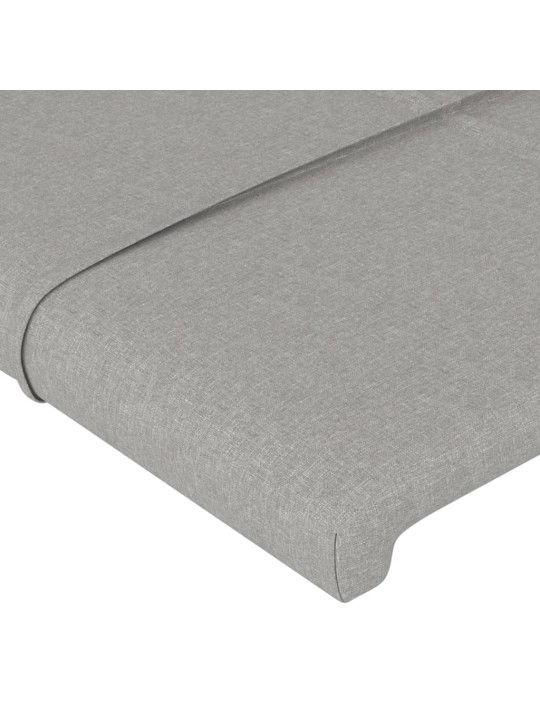 Čelo postele s LED světle šedé 203x16x118/128 cm textil