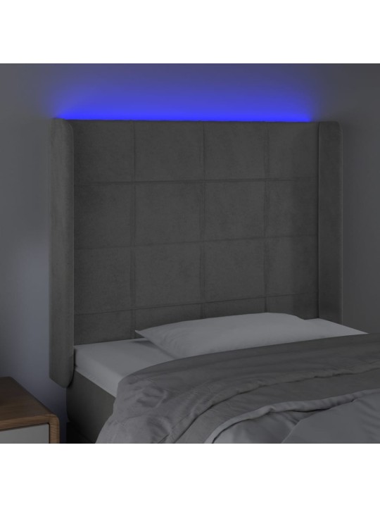 Čelo postele s LED světle šedé 103 x 16 x 118/128 cm samet