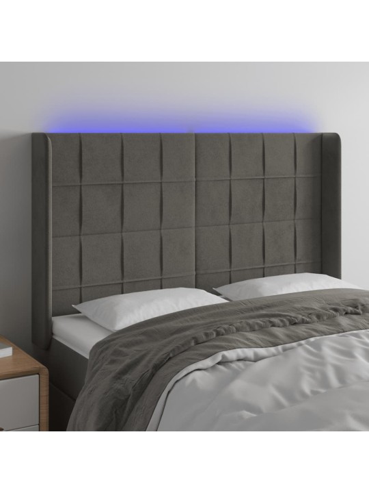 Čelo postele s LED tmavě šedé 147 x 16 x 118/128 cm samet