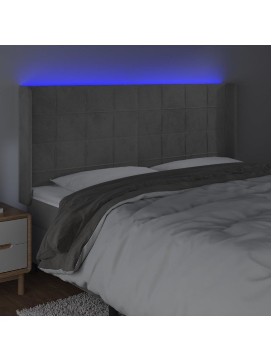 Čelo postele s LED světle šedé 183 x 16 x 118/128 cm samet