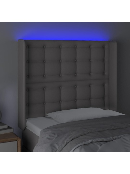 Čelo postele s LED šedé 83 x 16 x 118/128 cm umělá kůže