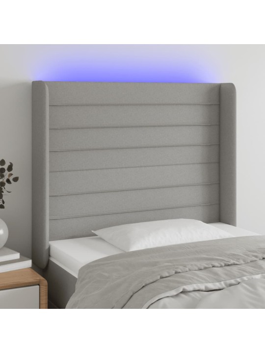 Čelo postele s LED světle šedé 93x16x118/128 cm textil