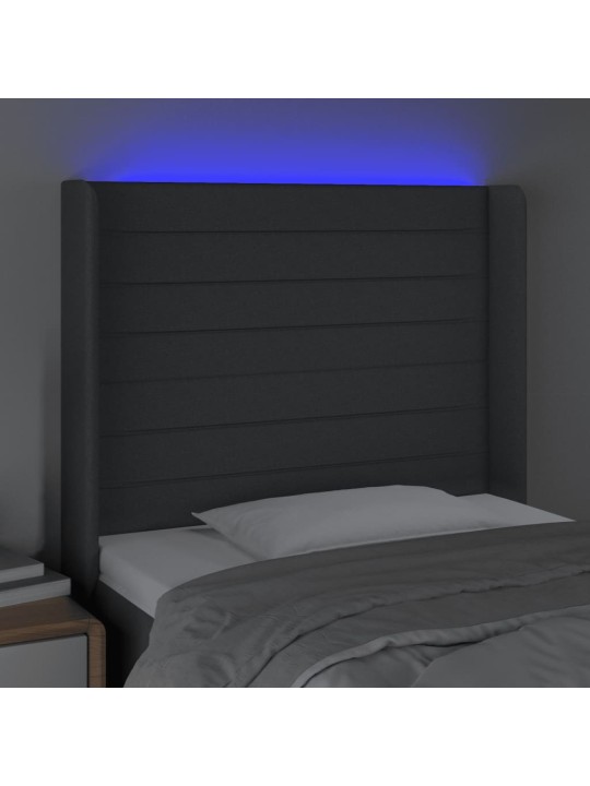 Čelo postele s LED tmavě šedé 103 x 16 x 118/128 cm textil