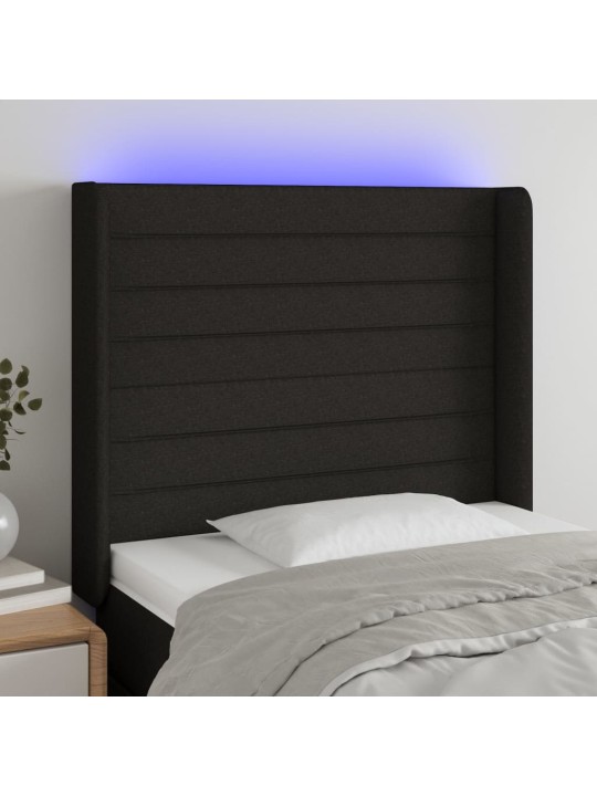 Čelo postele s LED černé 103 x 16 x 118/128 cm textil