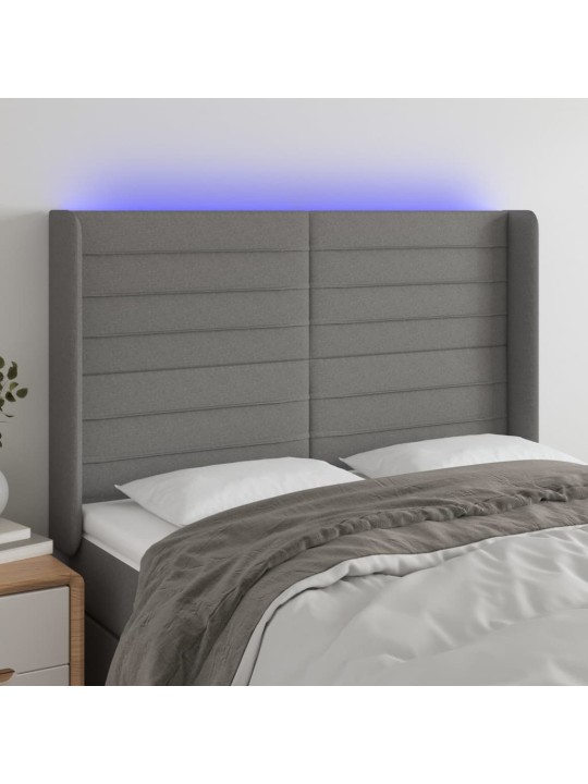 Čelo postele s LED tmavě šedé 147 x 16 x 118/128 cm textil