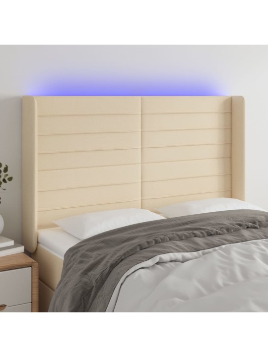 Čelo postele s LED krémové 147 x 16 x 118/128 cm textil