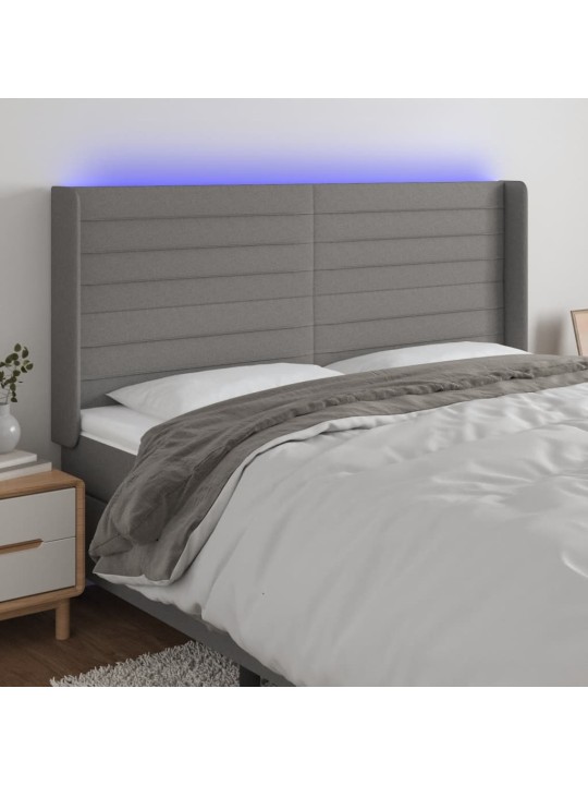 Čelo postele s LED tmavě šedé 163 x 16 x 118/128 cm textil