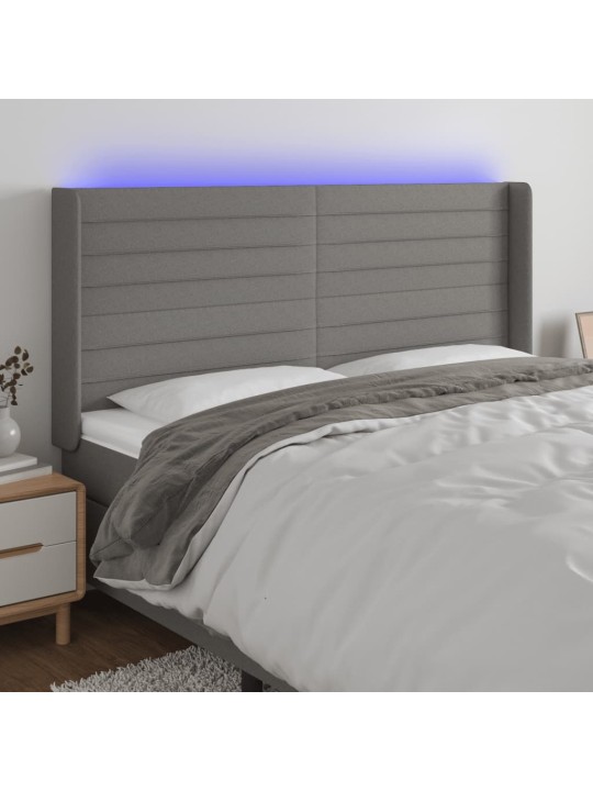 Čelo postele s LED tmavě šedé 183 x 16 x 118/128 cm textil