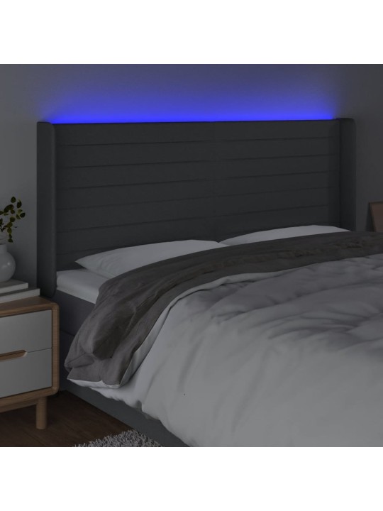 Čelo postele s LED tmavě šedé 203 x 16 x 118/128 cm textil