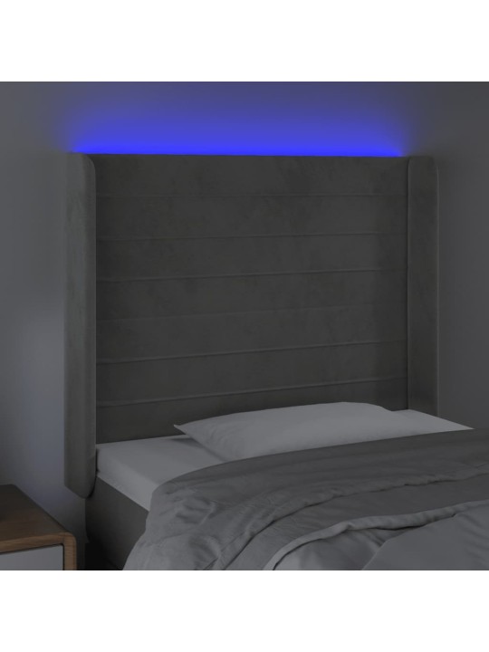 Čelo postele s LED světle šedé 83 x 16 x 118/128 cm samet