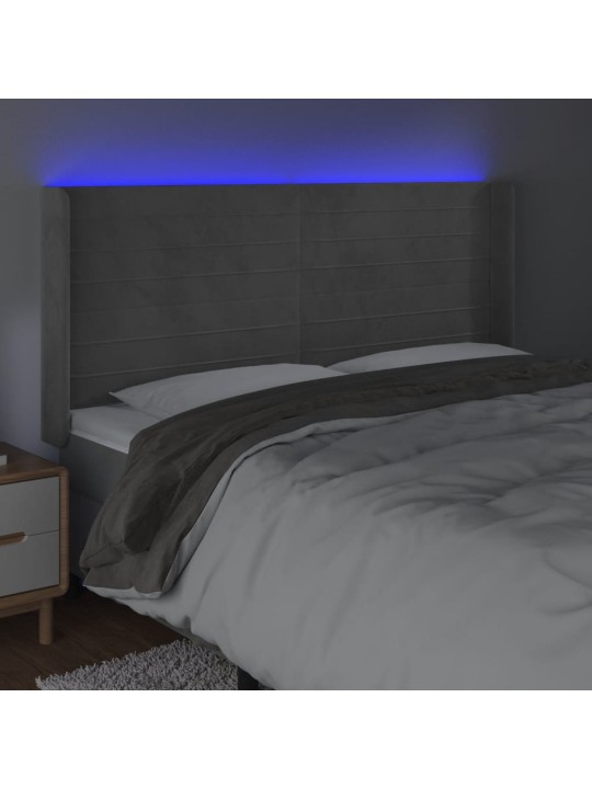 Čelo postele s LED světle šedé 183 x 16 x 118/128 cm samet