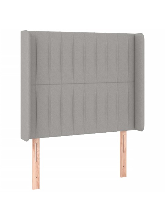 Čelo postele s LED světle šedé 83 x 16 x 118/128 cm textil