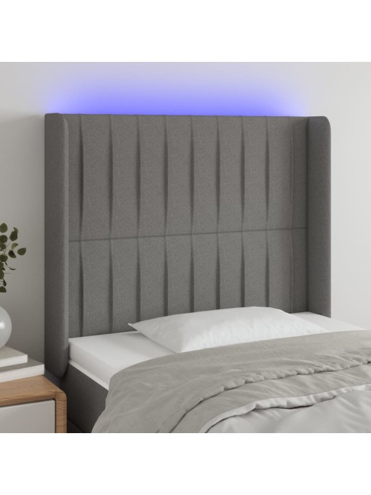 Čelo postele s LED tmavě šedé 83 x 16 x 118/128 cm textil