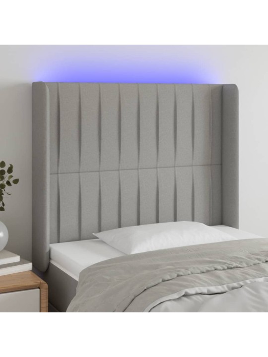 Čelo postele s LED světle šedé 93x16x118/128 cm textil