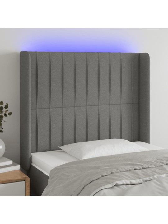 Čelo postele s LED tmavě šedé 103 x 16 x 118/128 cm textil