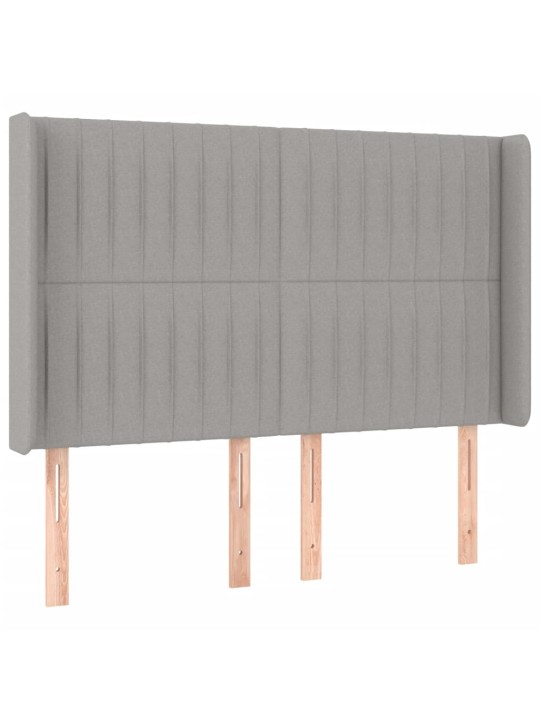 Čelo postele s LED světle šedé 147x16x118/128 cm textil