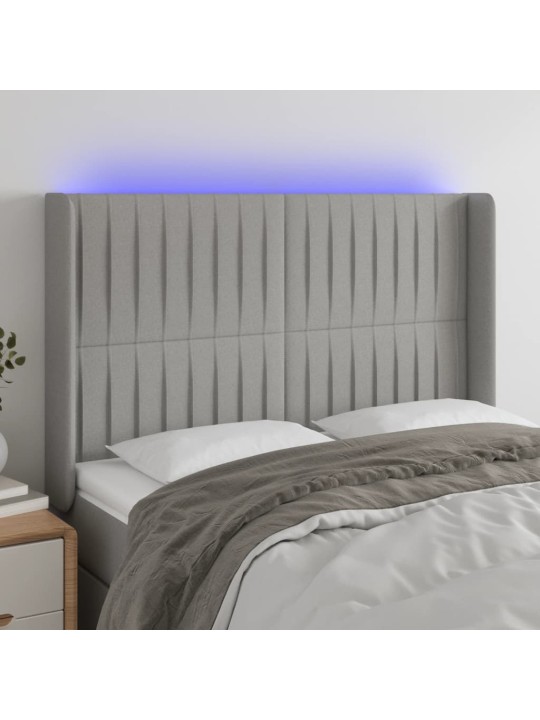 Čelo postele s LED světle šedé 147x16x118/128 cm textil