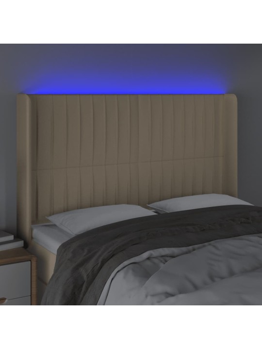 Čelo postele s led krémové 147 x 16 x 118/128 cm textil