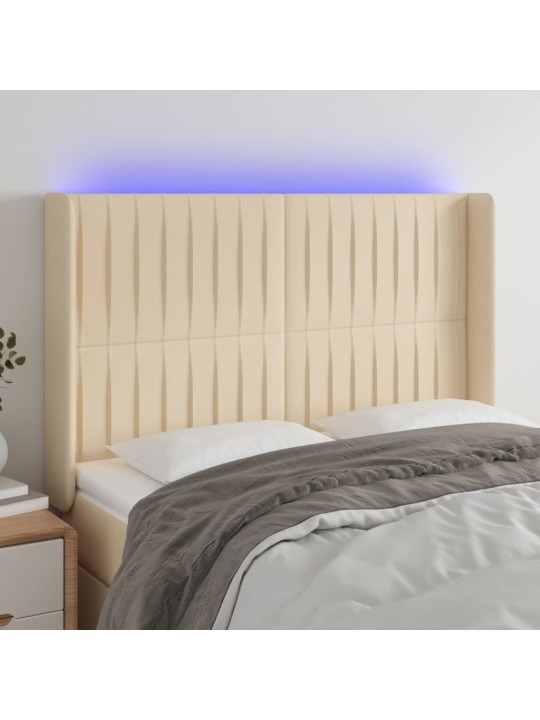 Čelo postele s led krémové 147 x 16 x 118/128 cm textil