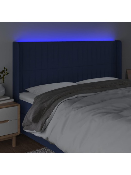 Čelo postele s LED modré 163 x 16 x 118/128 cm textil