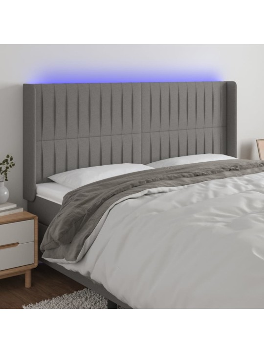 Čelo postele s LED tmavě šedé 183 x 16 x 118/128 cm textil