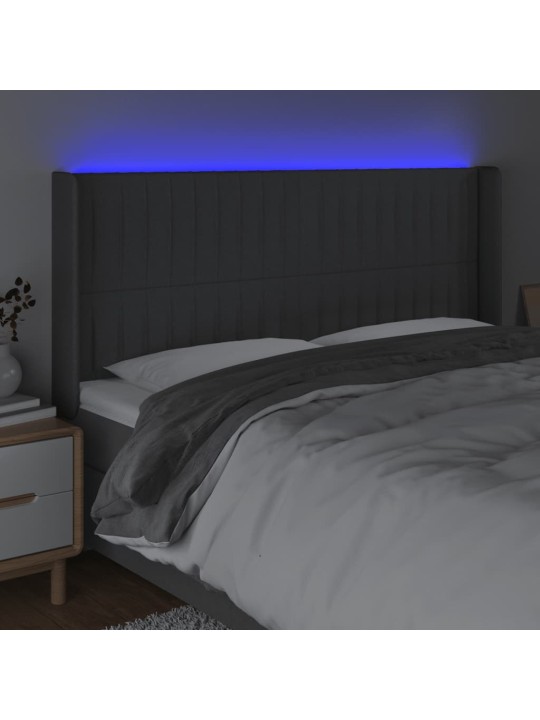 Čelo postele s LED tmavě šedé 203 x 16 x 118/128 cm textil