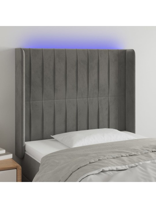 Čelo postele s LED světle šedé 103 x 16 x 118/128 cm samet