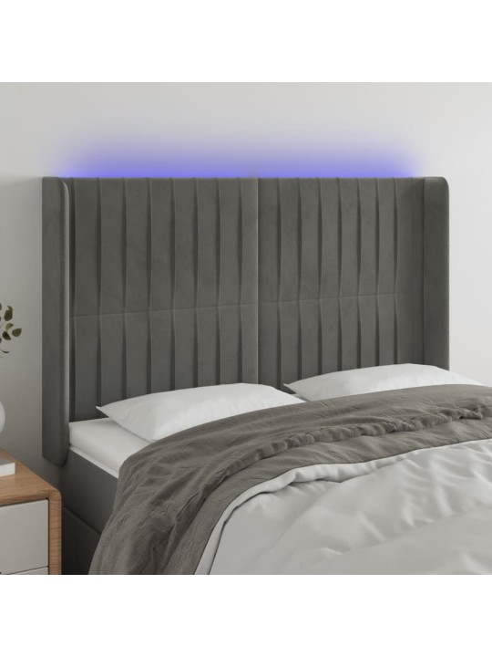 Čelo postele s LED světle šedé 147x16x118/128 cm samet