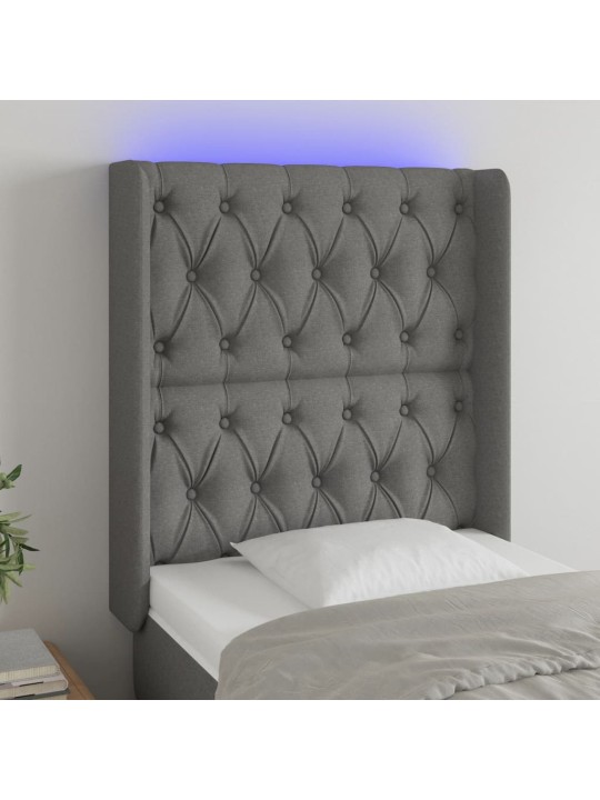 Čelo postele s LED tmavě šedé 83 x 16 x 118/128 cm textil