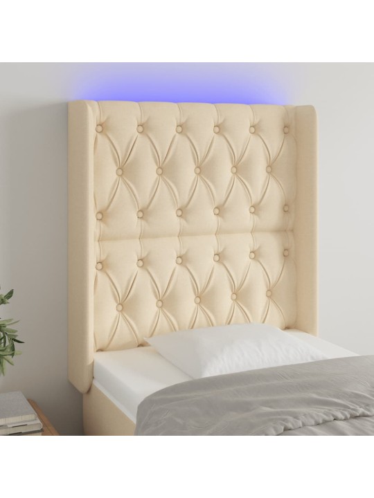 Čelo postele s LED krémové 83 x 16 x 118/128 cm textil