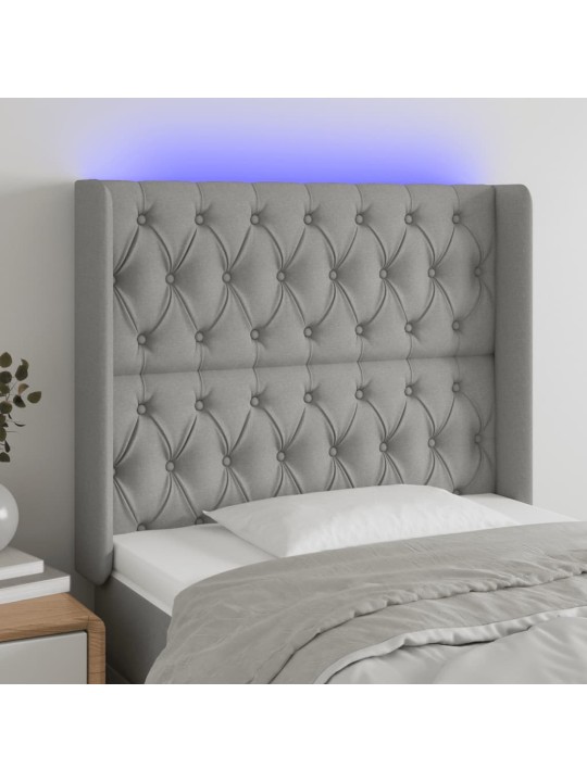 Čelo postele s LED světle šedé 93x16x118/128 cm textil
