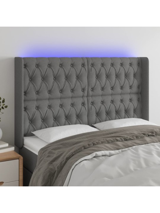 Čelo postele s LED tmavě šedé 147 x 16 x 118/128 cm textil