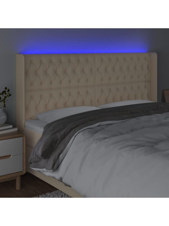 Čelo postele s led krémové 183 x 16 x 118/128 cm textil